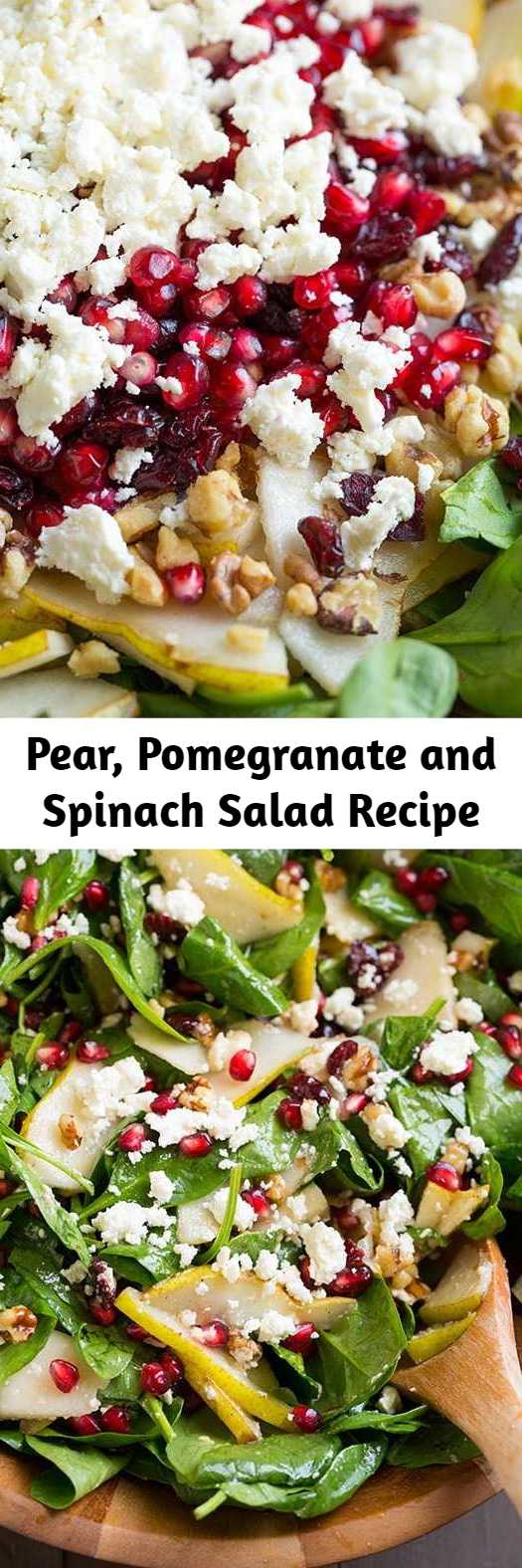 Pear, Pomegranate and Spinach Salad Recipe - This colorful salad is brimming with fresh flavor it's it's perfect for the holidays. I love how festive the arils look in this salad when paired with the greens, and of course I’m in love with the entire flavor combination of this salad!