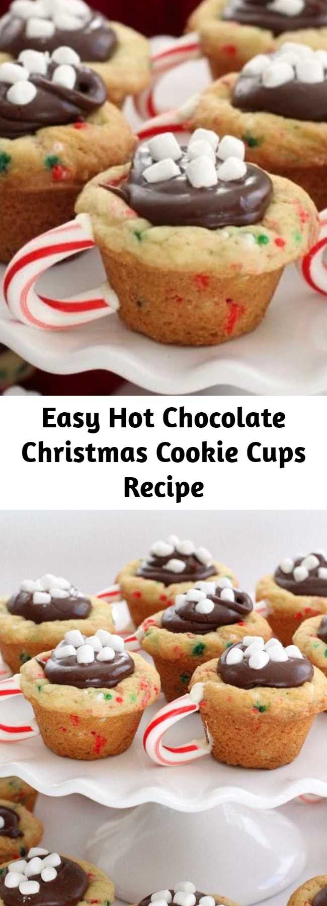 Easy Hot Chocolate Christmas Cookie Cups Recipe - Hot Chocolate Cookie Cups are the most fun & festive Christmas cookies ever! Sugar cookie cups filled with fudge, mini marshmallows & sprinkles with a darling candy cane handle!